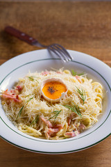 Pasta carbonara. Creamy Spaghetti Carbonara. Italian cuisine dish. View from above, top studio shot