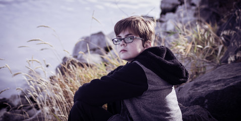 Portrait of a Boy With Glasses in Autumn