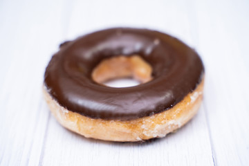 close up chocolate coating doughnut