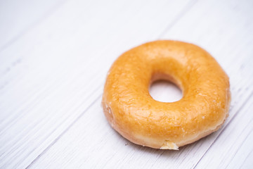 close up sugar coating doughnut