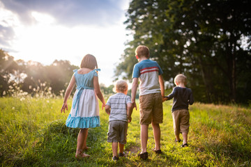 Fototapeta premium Siblings walking together