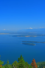 Panoramic view of the San Juan Islands with Mount Baker in the background as seen from Mount Constitution on Orcas Island, Washington