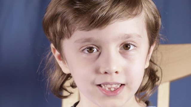 Laughing boy of six years old. Closeup