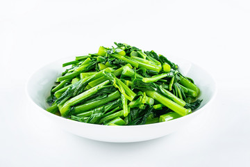 Chinese dish of fried cabbage with moss on white background