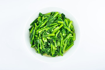 Chinese dish of fried cabbage with moss on white background