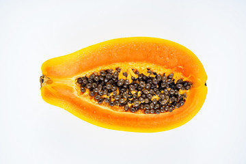 Papaya cut from a fresh fruit on a white background