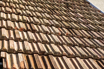 old colored red roof tiles closeup