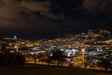 Fototapeta na wymiar View of Quito by night from the park Itchimbia