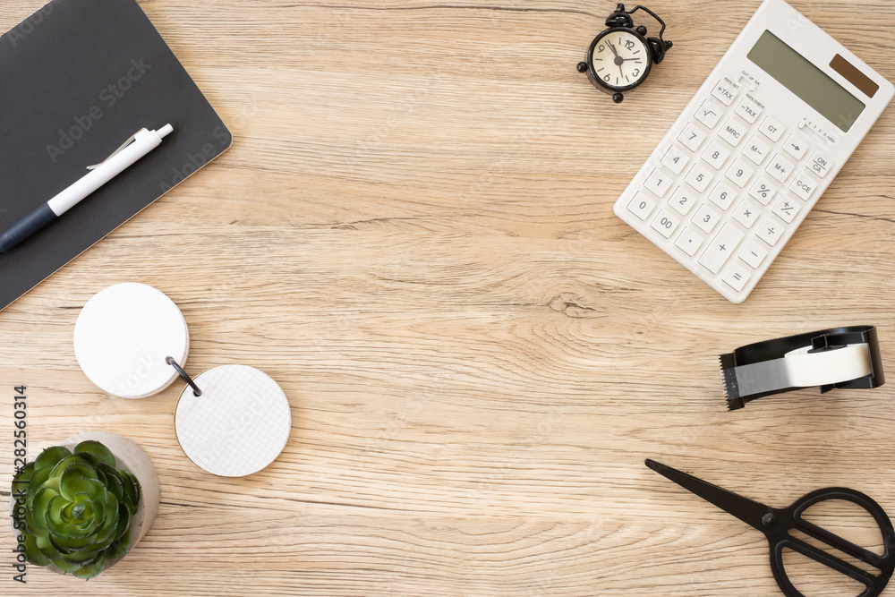 Poster top view office stationery on wooden table with copy space.student stuff on desk.education concept