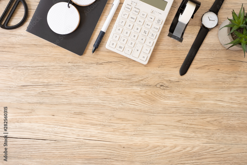 Poster top view office stationery on wooden table with copy space.student stuff on desk.education concept