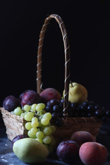 Still life fruits, grape,plum,peach and pear