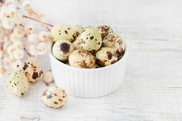 Bowl with quail egg decorated with jute bow. Easter decorations