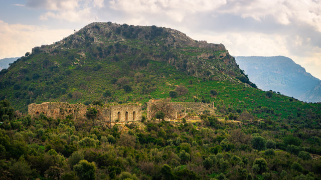 Kaunos (Caunus) Ancient City ruins. Ancient Roman Theater exterior view. Dalyan, Mugla, Turkey