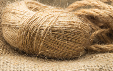 Wrapped linen rope and natural linen fabric texture. Close up shooting
