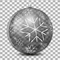Transparent glass ball on an abstract background with a pattern of large white snowflakes and a snow blizzard. Realistic image of decoration for the xmas tree for any background.