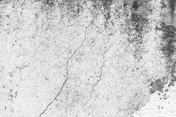 Texture of a concrete wall with cracks and scratches which can be used as a background
