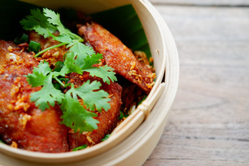 chicken wing on wooden table