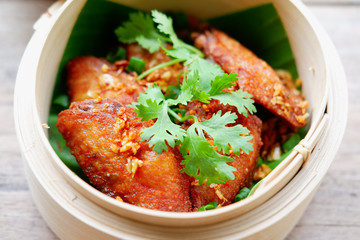 chicken wing on wood table