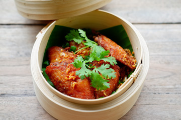 chicken wing on wooden table