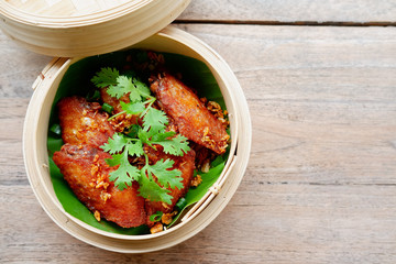 chicken wing on wooden table