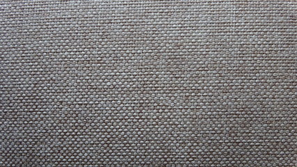 Fototapeta na wymiar textile surface light brown structured wool