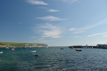 Fototapeta na wymiar The beach and seafront at Swanage on the Dorset coast in Southern England
