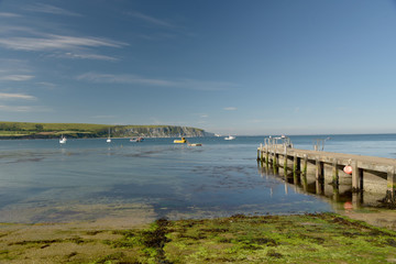 Fototapeta na wymiar The beach and seafront at Swanage on the Dorset coast in Southern England