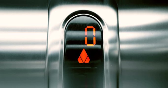 detail of led number of elevator that go up from zero to first floor, business and technology