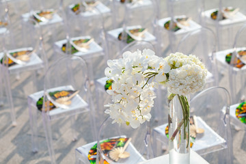 wedding detail (closeup of beautiful wedding decorated on beach wedding setup)