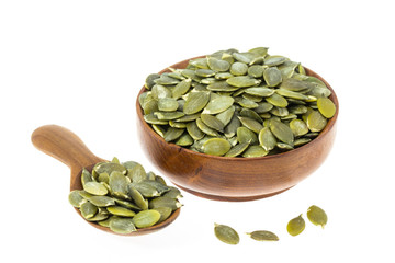 Raw green Pumpkin seeds isolated on white background