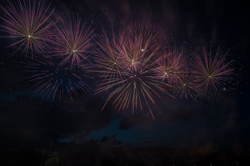 Colorful fireworks close up, fireworks explosion in dark sky. Free space for text. Ventspils city festival. Latvia.