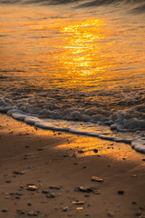 Beautiful sunset and sea wave