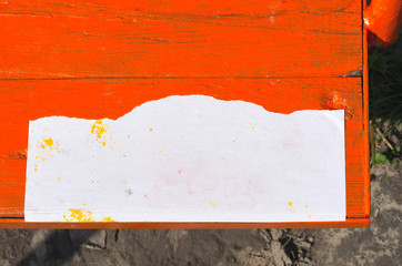 Blank Paper Sign on Orange Timber Swing Seat Mock Up.