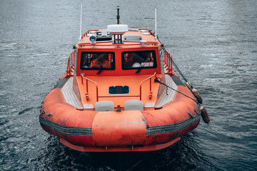 Marine rescue boat in the port on the water