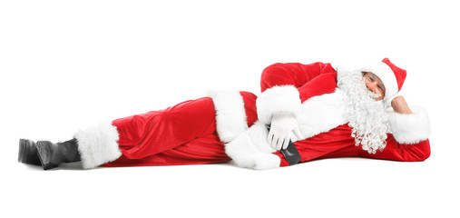 Portrait of lying Santa Claus on white background
