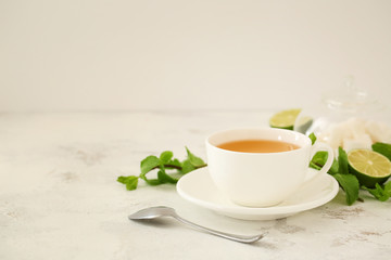 Obraz na płótnie Canvas Cup of hot tea on table