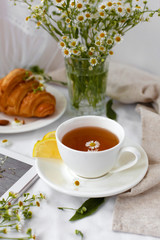 Still life with drinks, food and field flowers. Provencal style photo, beautiful french breakfast, pleasure morning
