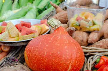 Large assortment of seasonal fruits and vegetables sold at farme