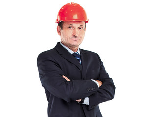Experienced engineer, the architect, stands with his hands folde