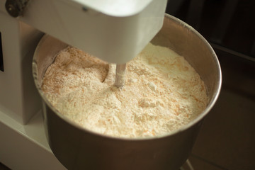 professional mixer whips dessert. equipment in the kitchen