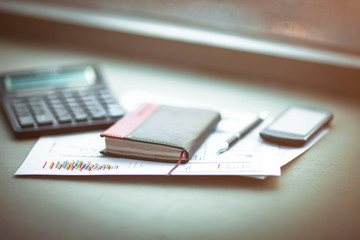 Drawings and charts of successful business, workplace of the businessman