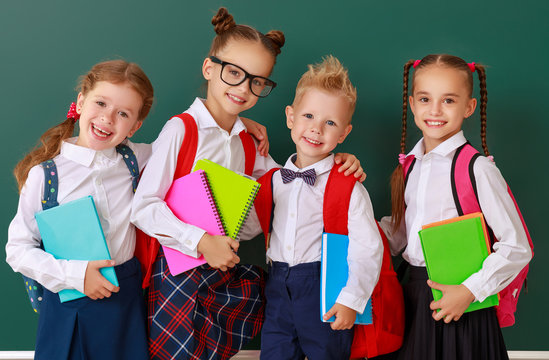 Funny Group Children   Schoolboy  And Schoolgirl, Student Boy  And Girl About School Blackboard.