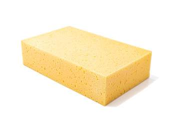 Yellow sponges for dishwashing isolated on a white background, Selective focus.