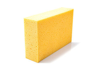 Yellow sponges for dishwashing isolated on a white background, Selective focus.