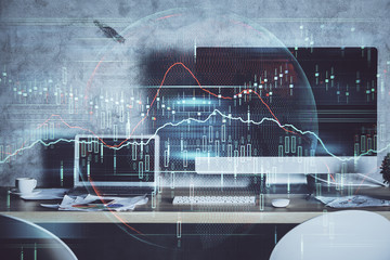 Double exposure of graph and financial info and work space with computer background. Concept of international online trading.