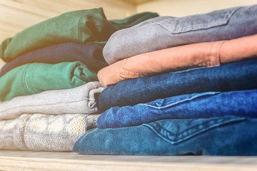 In the closet are new sweaters and jeans, bought by autumn.