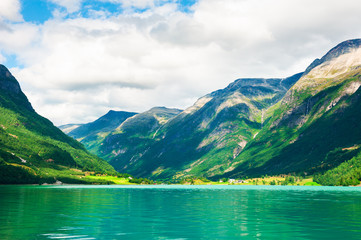 Oldevatnet lake with green water in the mountains in Norway. Beautiful summer landscape
