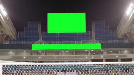 Scoreboard at the Football Stadium with a Green Screen