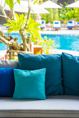 Fototapeta na wymiar Comfortable pillow on sofa decoration outdoor patio