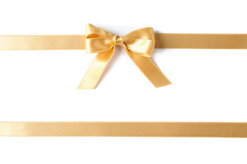Golden ribbons with bow isolated on white background. Gift concept
